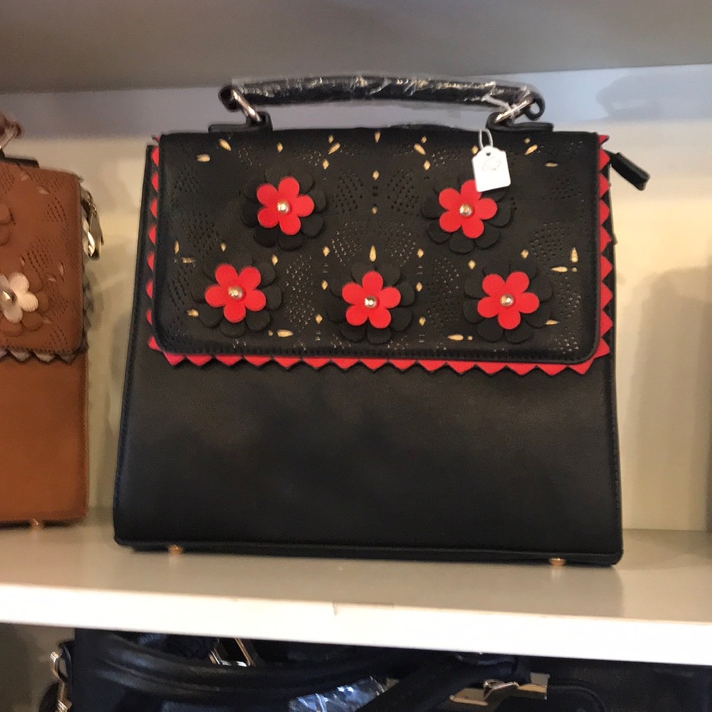Adorable black purse with flowers